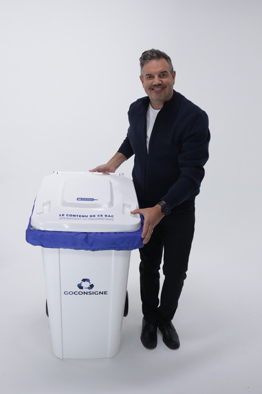 Man on white bin